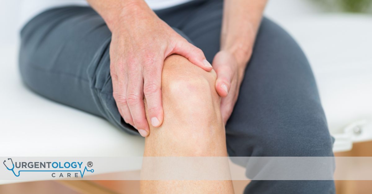 person holding injured knee