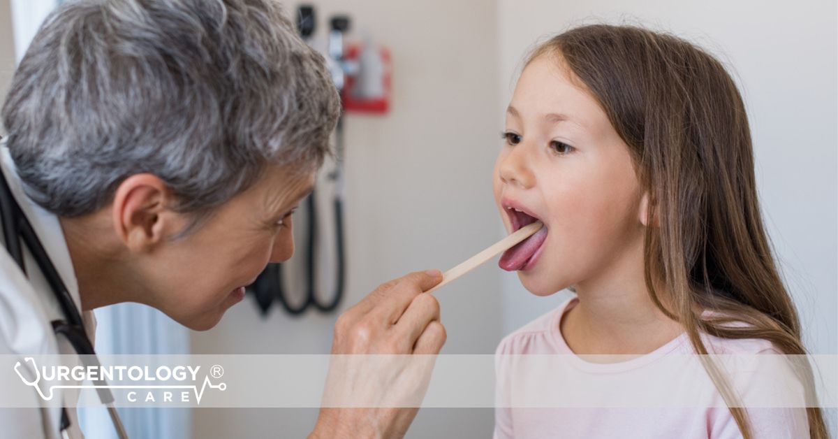 doctor checking child's throat