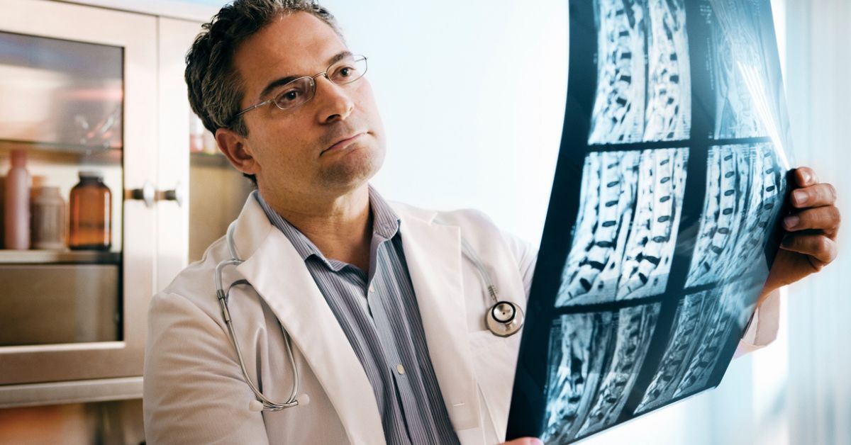 doctor looking at xray