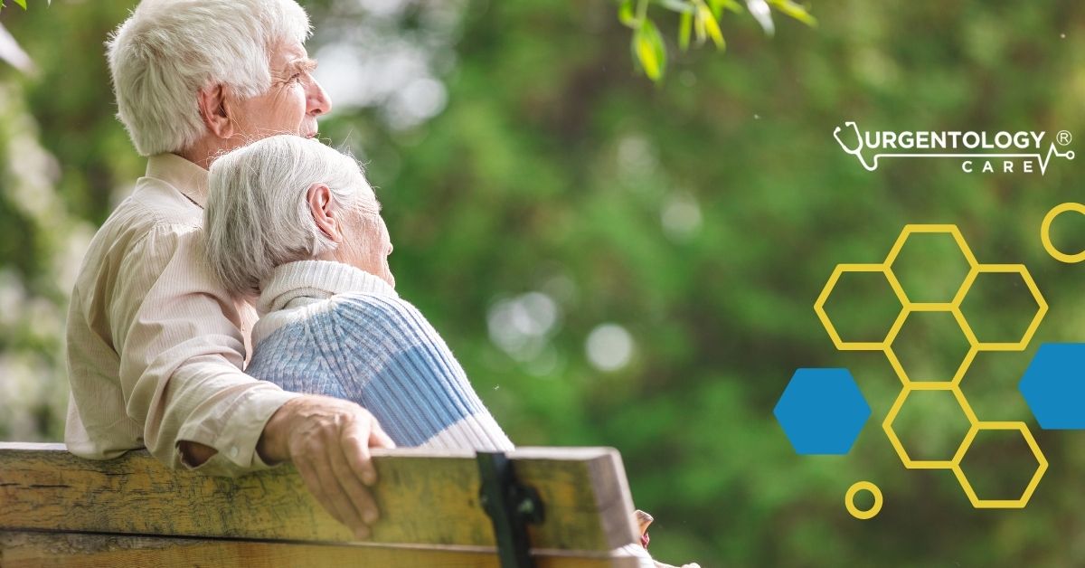 older couple man woman on park bench